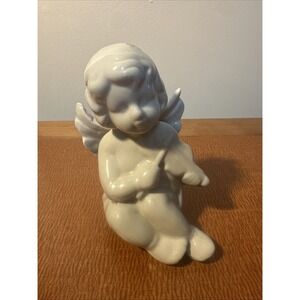 Vtg White Glossy Porcelain Sitting Cherub Playing the Violin Figurine 4" by 3"